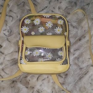 A daisy see-through mini backpack
